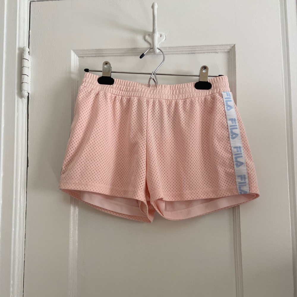 Pink FILA shorts with white and blue accent on the sides.